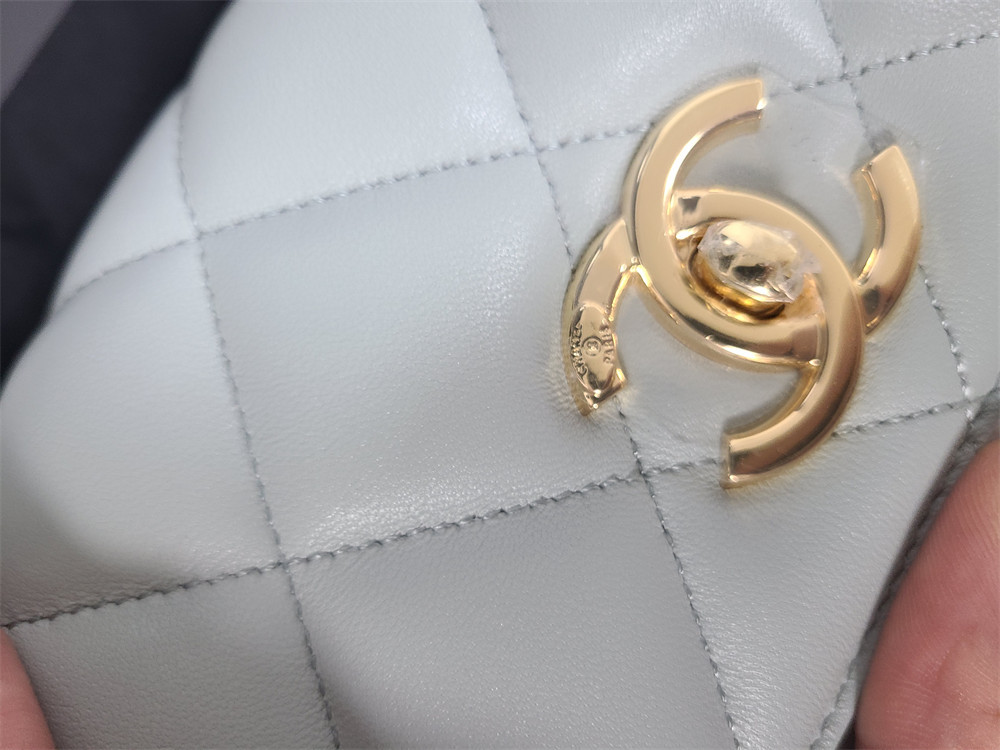 Ch*el flap bag with top handle 6.6 × 9.8 × 4.7 in