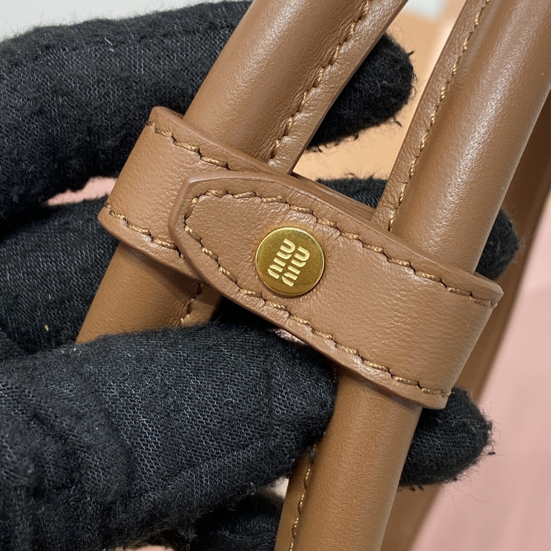 Miu Miu Leather patchwork Beau bag 23x34x10cm