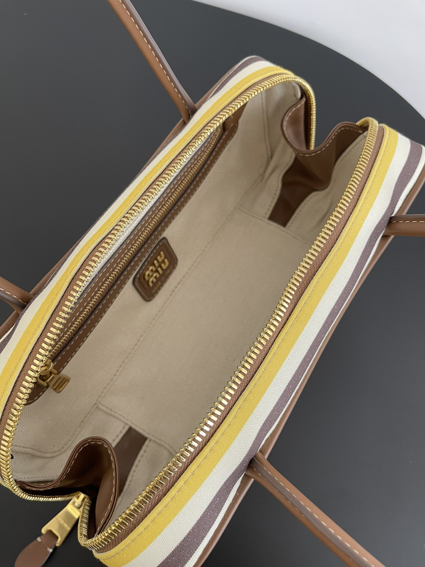 Miu Miu Beau canvas and leather bag 11.5x28x8cm